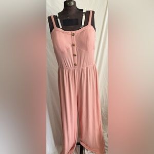 This is a pink jumpsuit, size XL, with tank top front.
